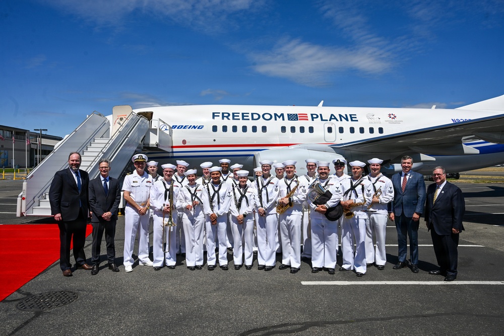 Navy Band Northwest Poses with Freedom Plane