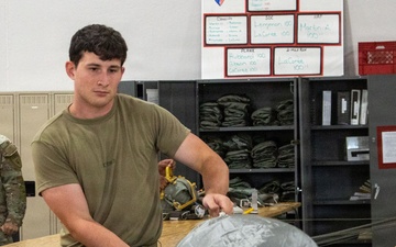 338th QM TADC prep parachutes for air drop