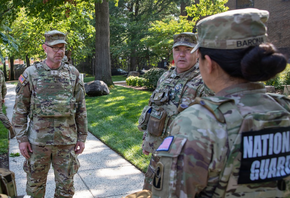 U.S. Army Chief Warrant Officer 5 Aaron Anderson and Chief Warrant Officer 5 Robert Gibson Check-in with Florida Guardsmen
