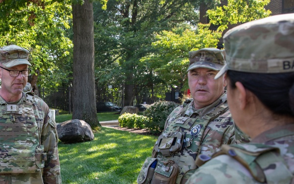U.S. Army Chief Warrant Officer 5 Aaron Anderson and Chief Warrant Officer 5 Robert Gibson Check-in with Florida Guardsmen