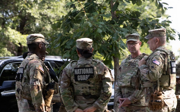 U.S. Army Chief Warrant Officer 5 Aaron Anderson and Chief Warrant Officer 5 Robert Gibson Check-in with Florida Guardsmen
