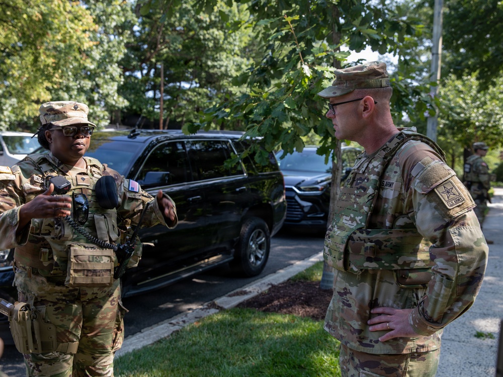 U.S. Army Chief Warrant Officer 5 Aaron Anderson and Chief Warrant Officer 5 Robert Gibson Check-in with Florida Guardsmen