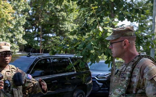 U.S. Army Chief Warrant Officer 5 Aaron Anderson and Chief Warrant Officer 5 Robert Gibson Check-in with Florida Guardsmen