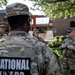 U.S. Army Chief Warrant Officer 5 Aaron Anderson and Chief Warrant Officer 5 Robert Gibson Check-in with Florida Guardsmen