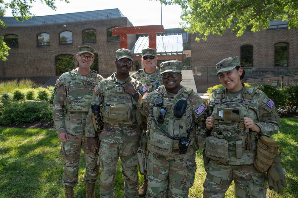 U.S. Army Chief Warrant Officer 5 Aaron Anderson and Chief Warrant Officer 5 Robert Gibson Check-in with Florida Guardsmen