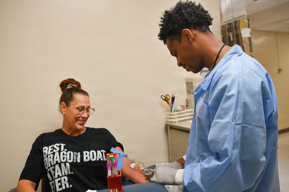 Naval Hospital Pensacola Corpsmen Perform Venipunctures at the Laboratory