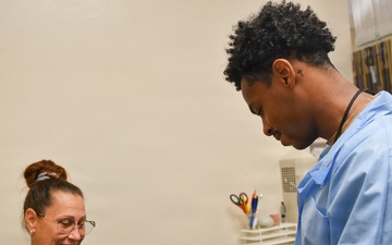 Naval Hospital Pensacola Corpsmen Perform Venipunctures at the Laboratory