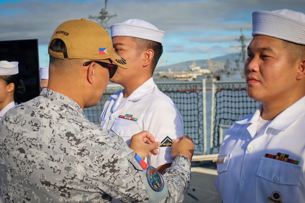 Philippine Navy sailors receive new ranks during RIMPAC 2026