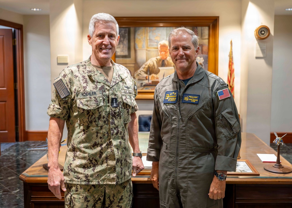 Adm. Steve Koehler, commander, U.S. Pacific Fleet, meets with Vice Adm. Marc Miguez, commander, U.S. Pacific Fleet