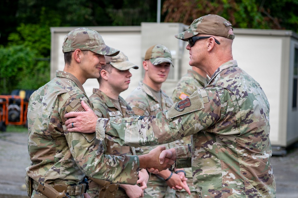 Col. Croson Coins Airman supporting National Scout Jamboree