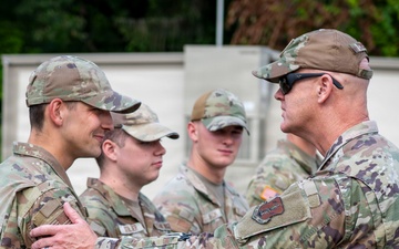 Col. Croson Coins Airman supporting National Scout Jamboree