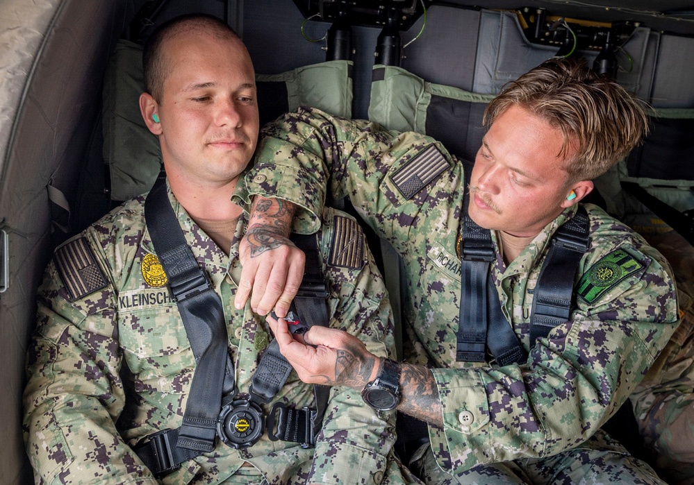 Navy seaman promotes on UH-60 Black Hawk