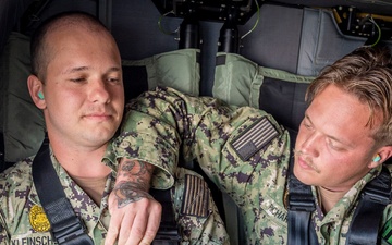 Navy seaman promotes on UH-60 Black Hawk
