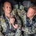 Navy seaman promotes on UH-60 Black Hawk