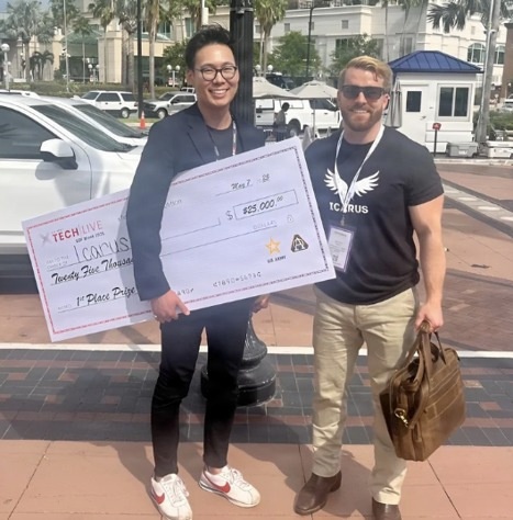 Henry Kwan, CEO (left) with Cameron Hargis, Head of Business (right) after winning 1st place at xTech|Live.