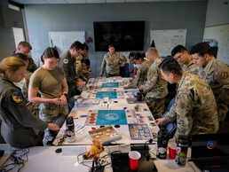Squadron Officer School Students participating in wargaming exercise
