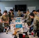 Squadron Officer School Students participating in wargaming exercise