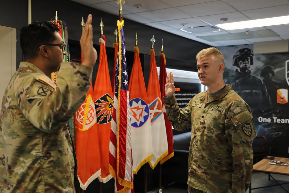 7th Signal Command Soldier Reaffirms Commitment Through Reenlistment