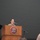 USARIEM COC/Relinquishment of Responsibility 2026 A female military service member in camouflage uniform is speaking at a podium bearing the USARIEM (U.S. Army Research Institute of Environmental Medicine) seal. She is addressing an audience in what appears to be an auditorium or formal meeting hall. An American flag and a music stand are visible in the background.