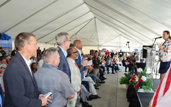 Dignitaries Stand During Remarks at Military or Civic Ceremony Held Under Large Event Tent