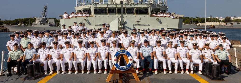 Royal Canadian Navy sailors pose aboard HMCS Ottawa during RIMPAC 2026