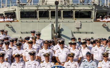 Royal Canadian Navy sailors pose aboard HMCS Ottawa during RIMPAC 2026