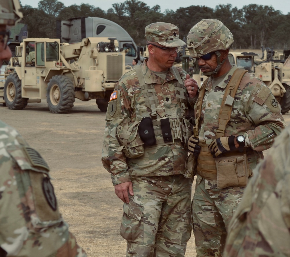 Chief observer‑controller guides 373rd Quartermaster Battalion staff through decision‑making at Fort Hunter‑Liggett