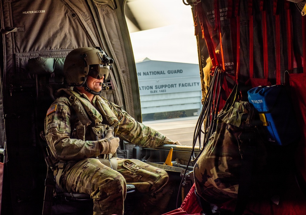 Oregon Guard aircrews begin water bucket missions on eastern Oregon wildfires