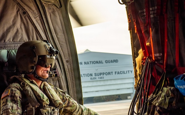 Oregon Guard aircrews begin water bucket missions on eastern Oregon wildfires