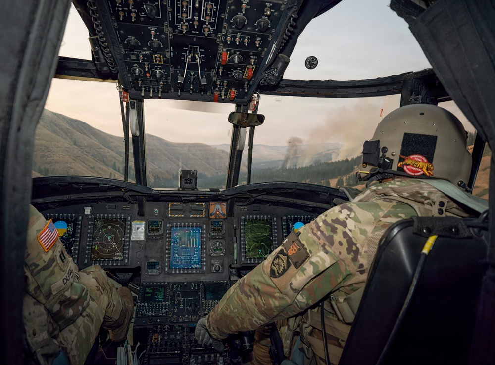 Oregon Guard aircrews begin water bucket missions on eastern Oregon wildfires