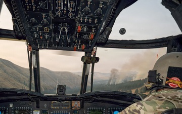 Oregon Guard aircrews begin water bucket missions on eastern Oregon wildfires