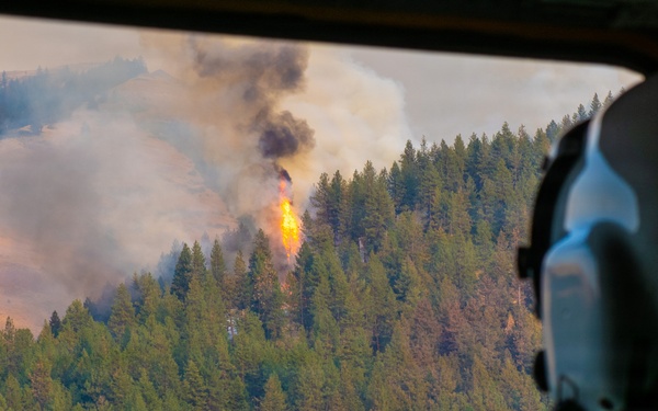 Oregon Guard aircrews begin water bucket missions on eastern Oregon wildfires