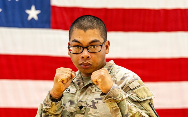 Soldier Poses for Combatives Tournament Portrait
