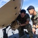 MWCS-18 Marines set up communication equipment