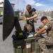 MWCS-18 Marines set up communication equipment