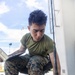 MWCS-18 Marines set up communication equipment