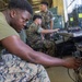 MWCS-18 Marines set up communication equipment