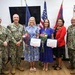 Katie Wrolstad and Cara Cole pose for a photo as the newly appointed command ombudsmen at U.S. Navy Medicine Readiness and Training Command Guam