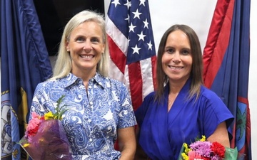 Katie Wrolstad and Cara Cole pose for a photo as the newly appointed command ombudsmen at U.S. Navy Medicine Readiness and Training Command Guam