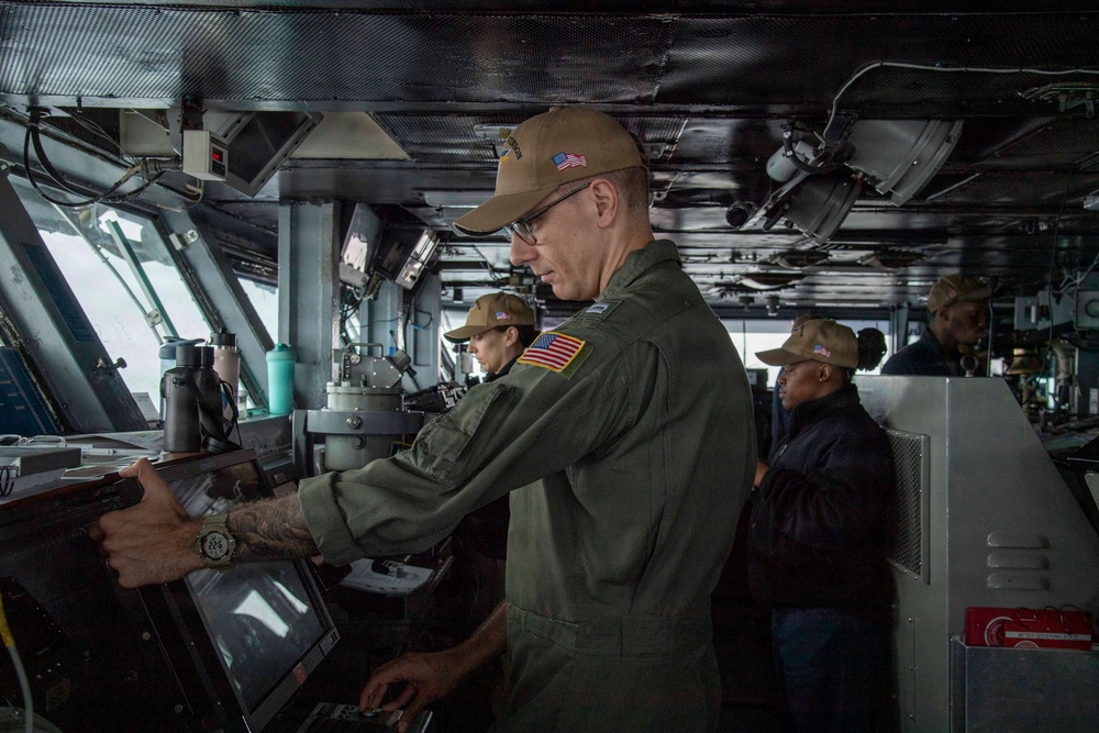 USS Carl Vinson (CVN 70) Sailor stands watch
