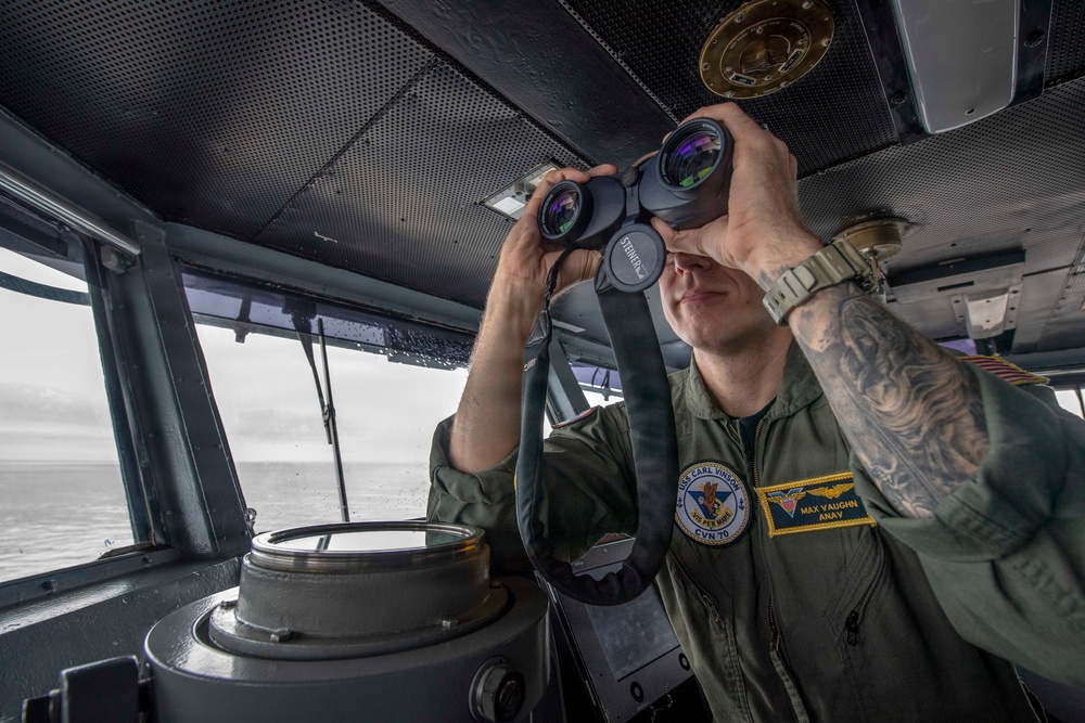 USS Carl Vinson (CVN 70) Sailor stands watch