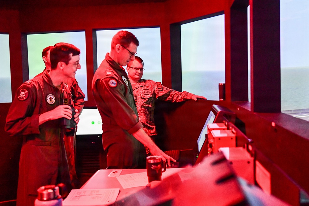 USS Carl Vinson (CVN 70) Sailors conducts navigation simulation
