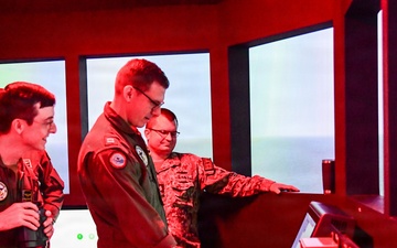 USS Carl Vinson (CVN 70) Sailors conducts navigation simulation