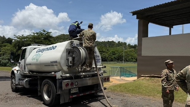 U.S. Army Soldiers Coordinate Water Distribution with Guaynabo City Tanker Truck in Puerto Rico