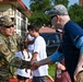 COL LIM GIVES OPENING REMARKS AT NFL FOOTBALL PROCAMP