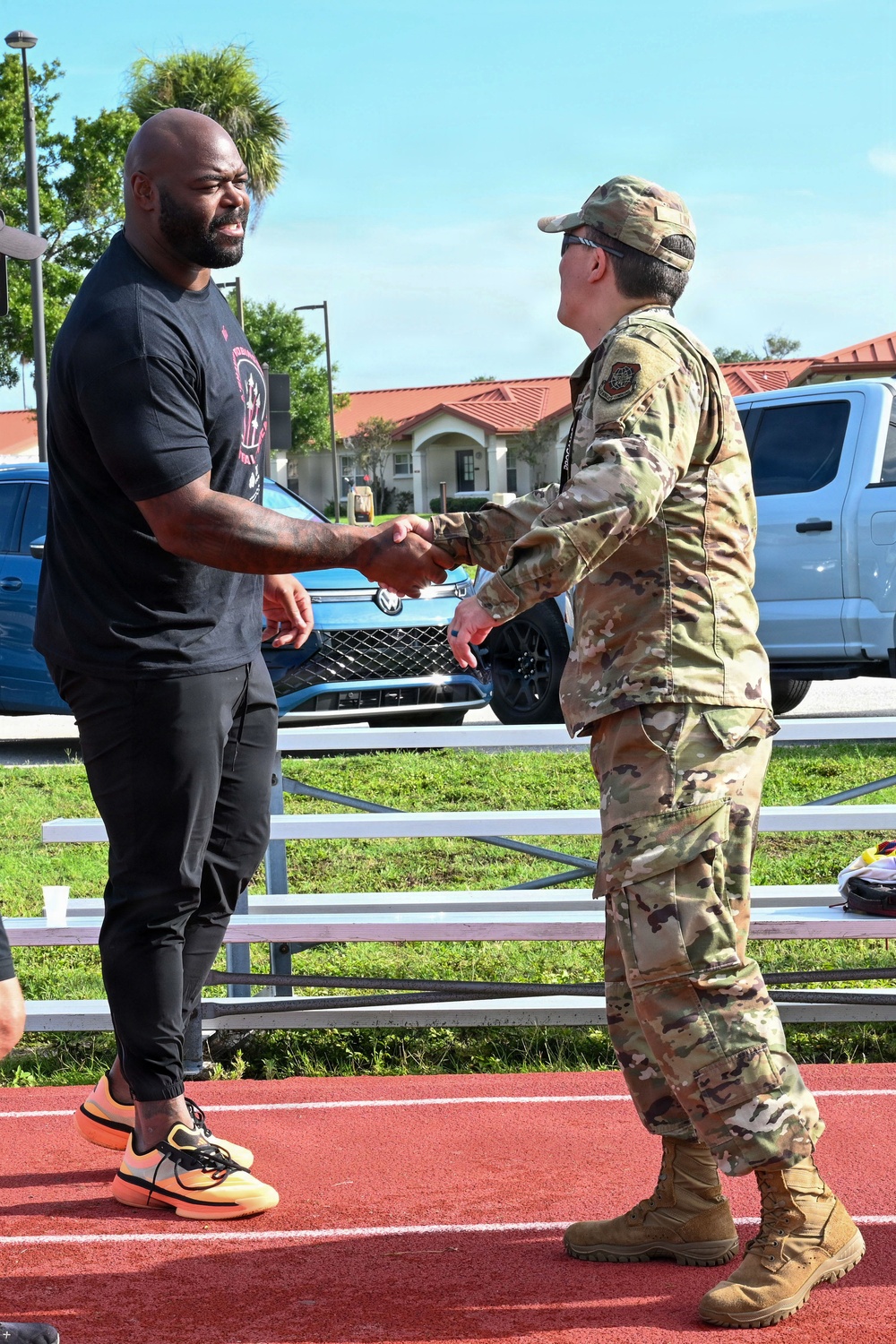 COL LIM GIVES OPENING REMARKS AT NFL FOOTBALL PROCAMP