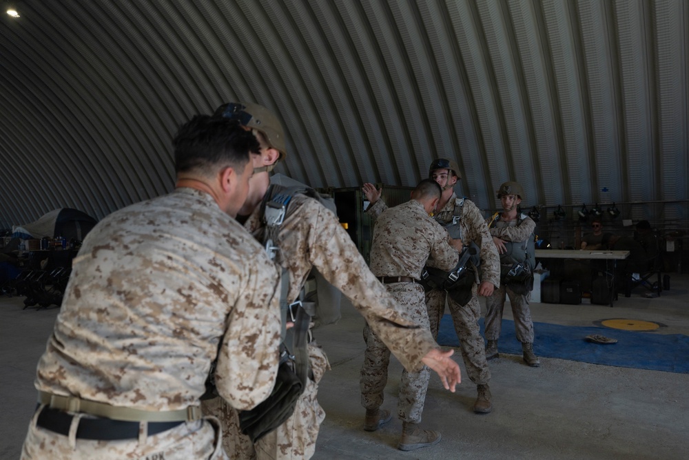 U.S. Marines with Combat Logistics Battalion 2 conduct a personnel jump at MCAGCC