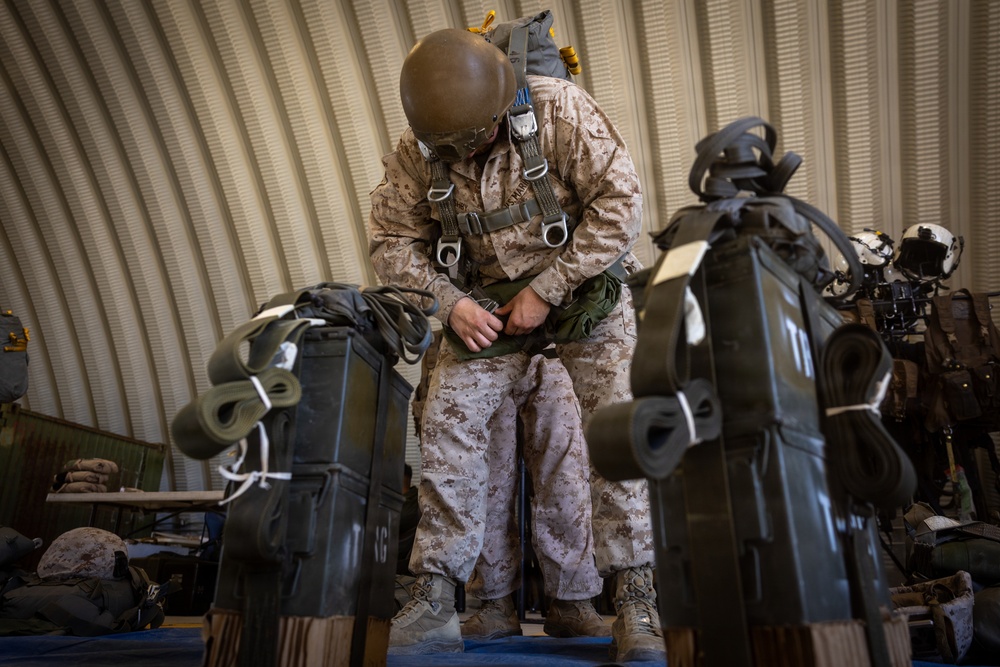 Marines with Combat Logistics Battalion conduct a personnel jump during SLTE 4-26