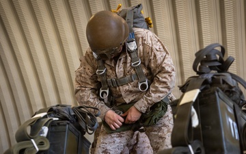 Marines with Combat Logistics Battalion conduct a personnel jump during SLTE 4-26