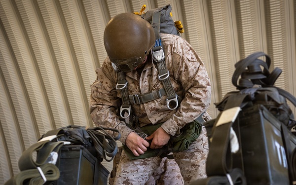 Marines with Combat Logistics Battalion conduct a personnel jump during SLTE 4-26